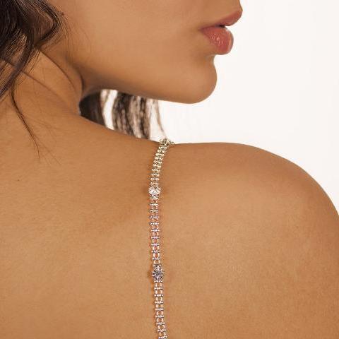 silver diamond bra straps on olive skin