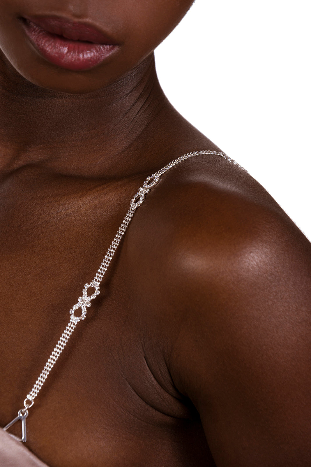 silver bra straps on dark skin